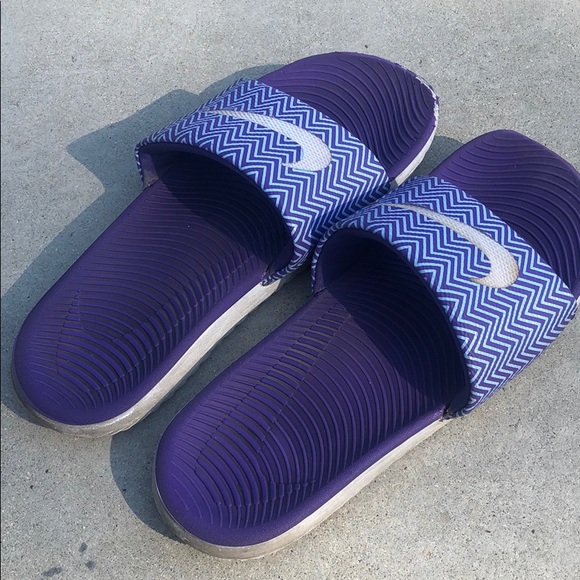 purple nike slides